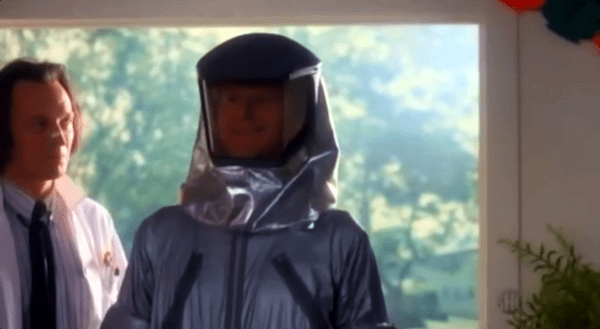 Frost enters the house in a hazmat suit