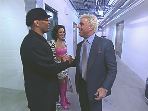 Ric Flair congratulates Ernest the Cat Miller on his win - WCW Sin