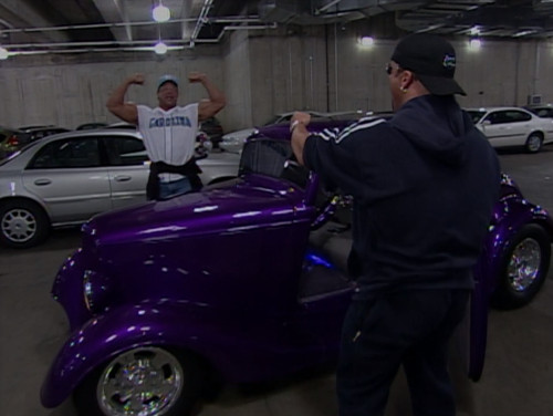 Totally Buff arrives at the arena in a hot rod - WCW Sin